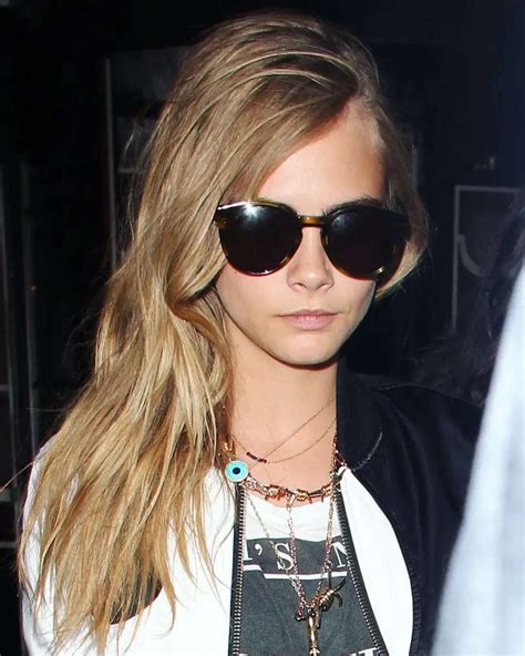 Cara Delevingne Sunglasses .